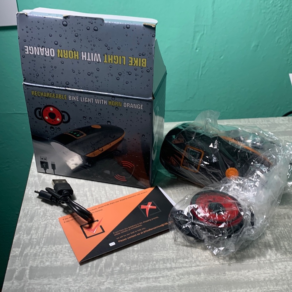 Rechargeable bike light with horn